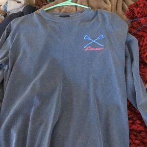 denim blue long sleeved lacrosse shirt